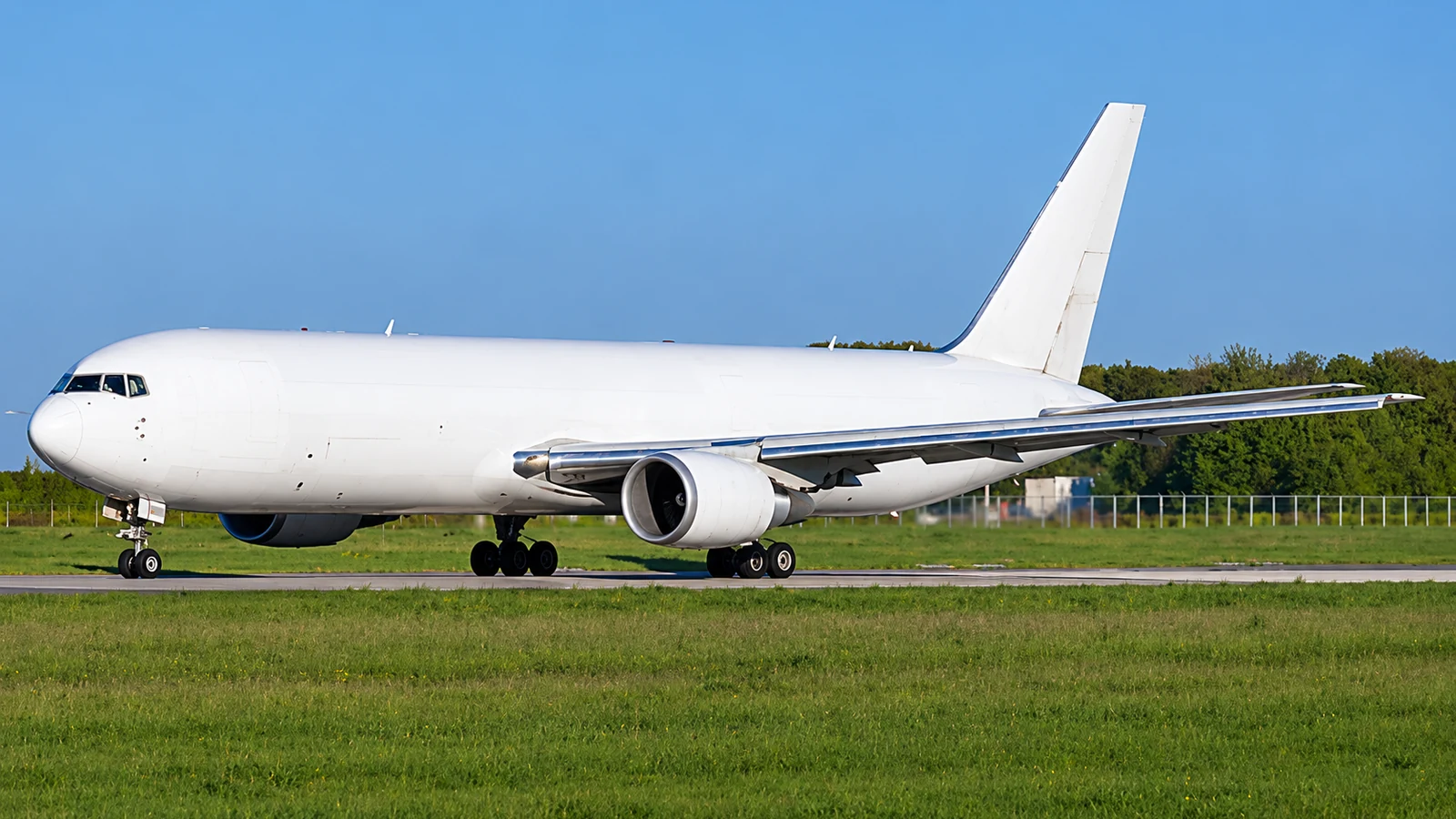 Boeing 767-300F cargo aircraft on an airport runway